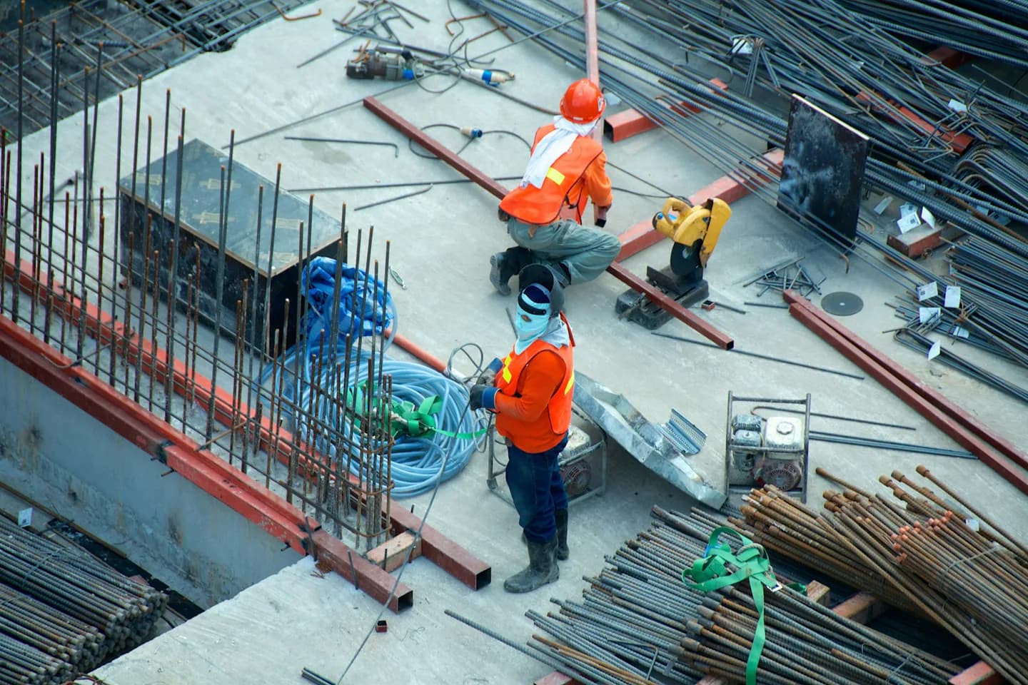 Construction professionals working on an active building site